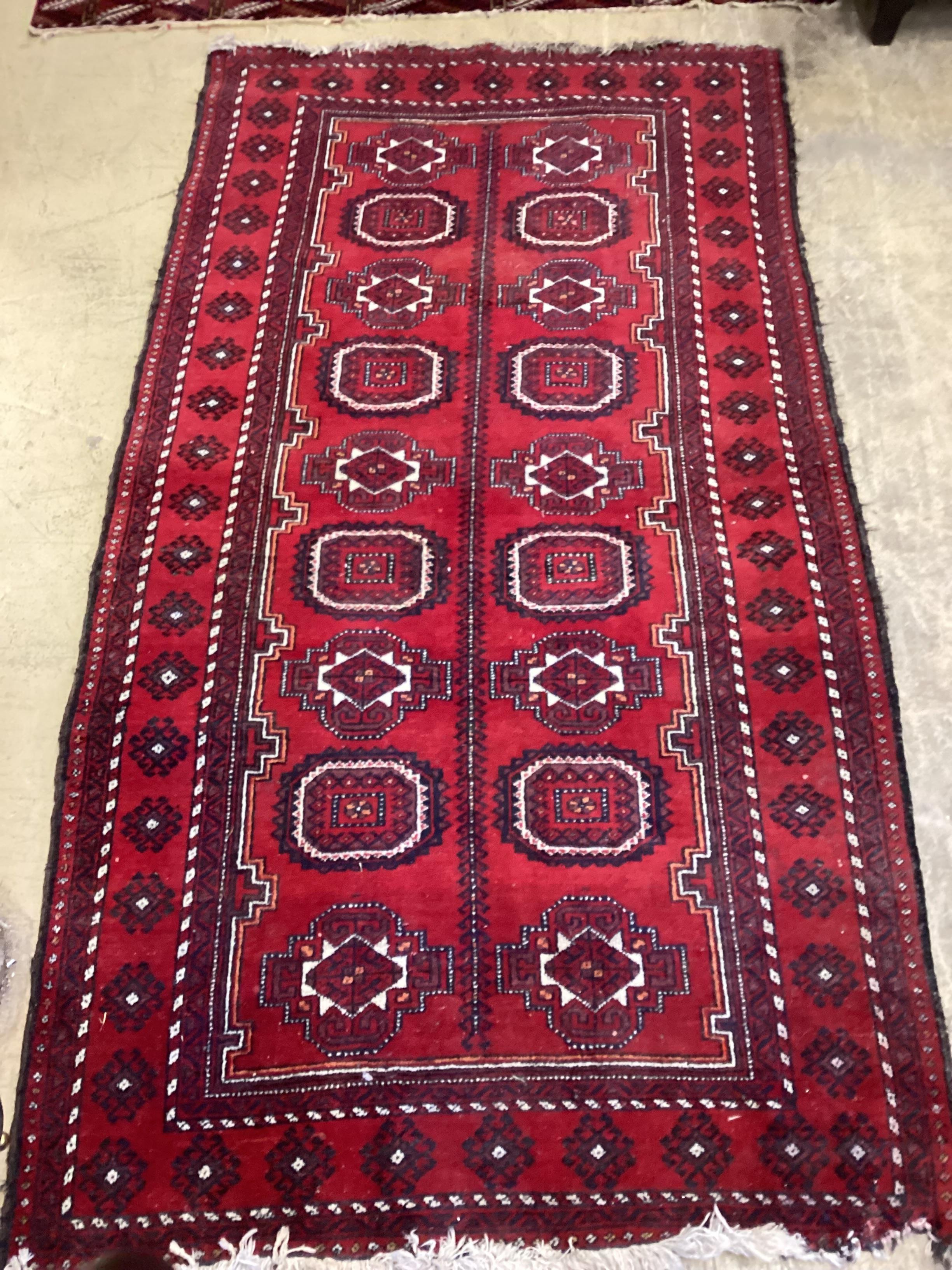 A Bokhara rug and a Belouch runner larger 250cm x 156cm, 200cm x 107cm